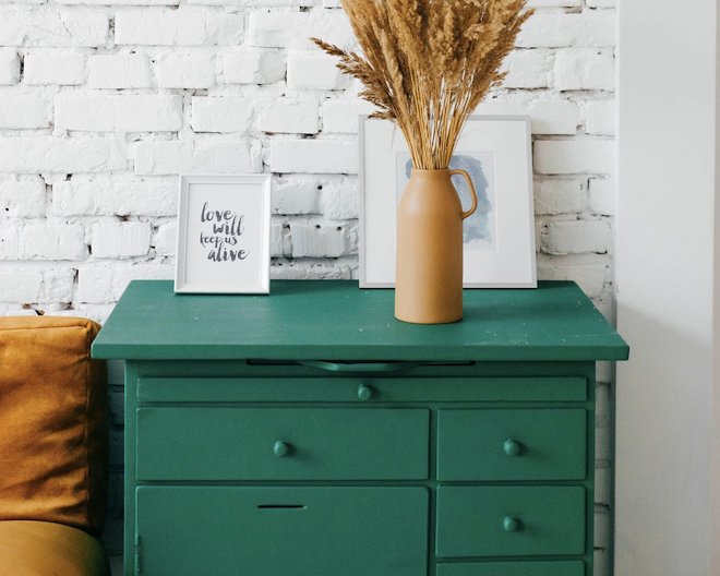 chest of drawers with objects on top